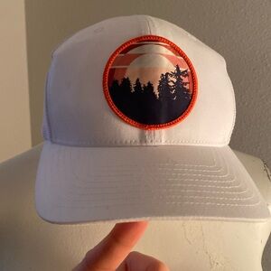 Columbia Brand snap back white baseball hat. Mountains hiking photo patch@front